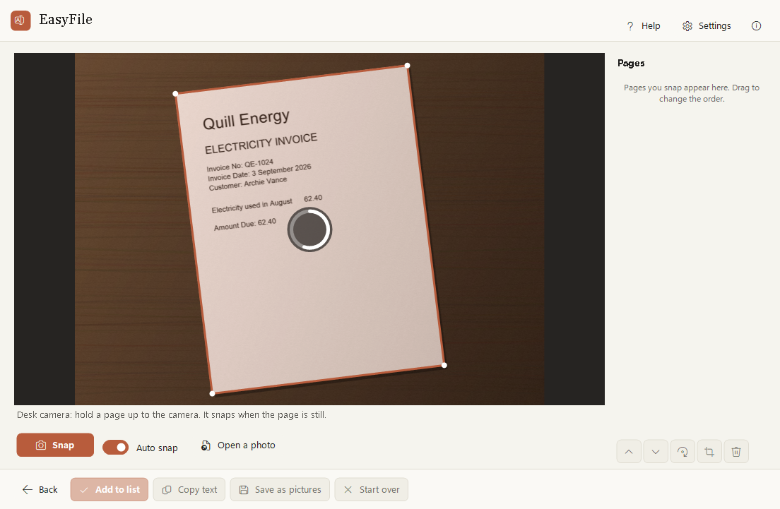 The webcam view: a Quill Energy electricity invoice held over a desk, its edges outlined, about to be snapped.